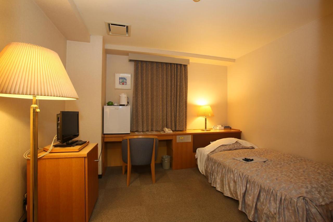 Business Hotel Masumi Sou Ikeda  Стая снимка